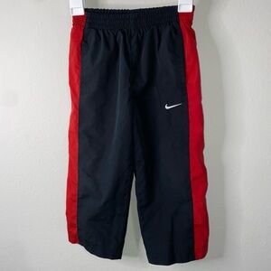 BOYS NIKE LINED WINDBREAKER PANTS
